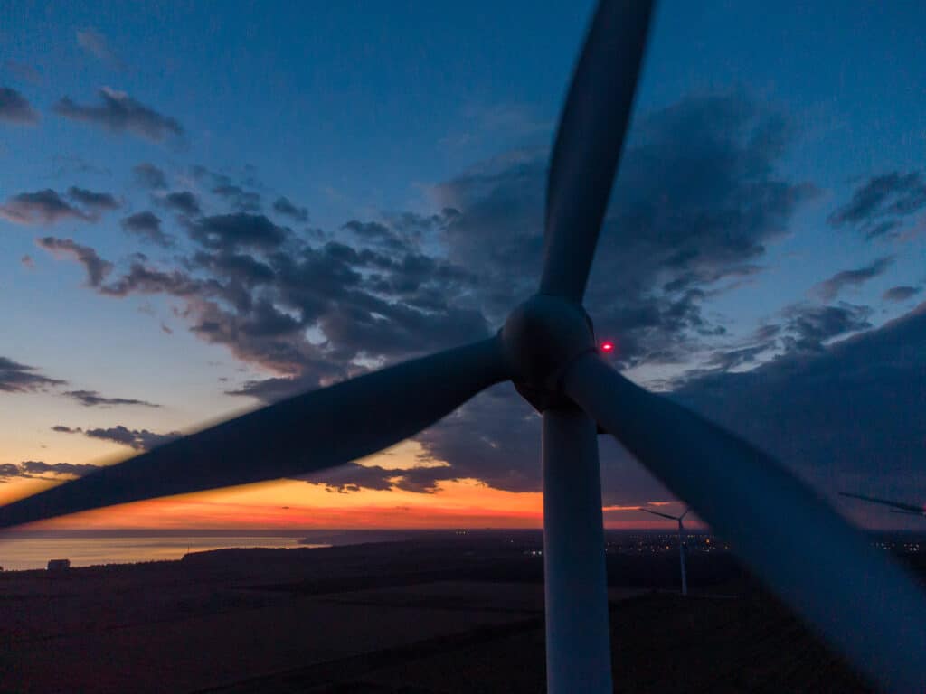 wind turbine at sunset close up 2023 11 27 05 06 04 utc